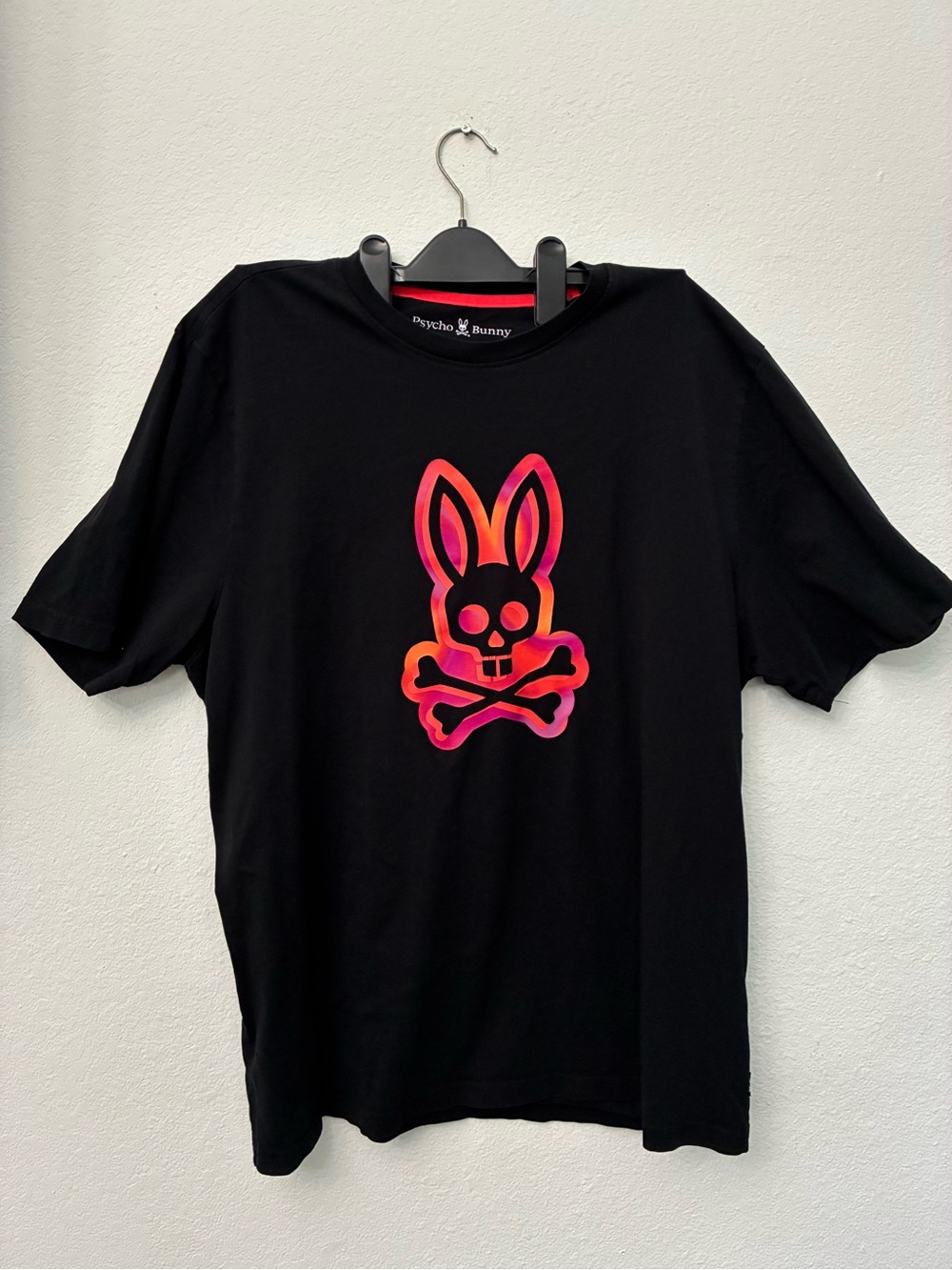 Psycho Bunny Black Tee with Pink-Orange Gradient Logo